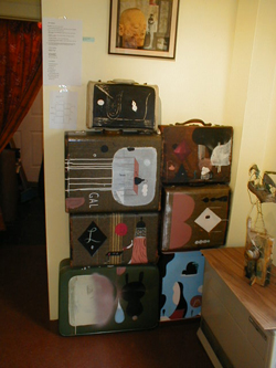 suitcase paintings by Patrick Corrigan